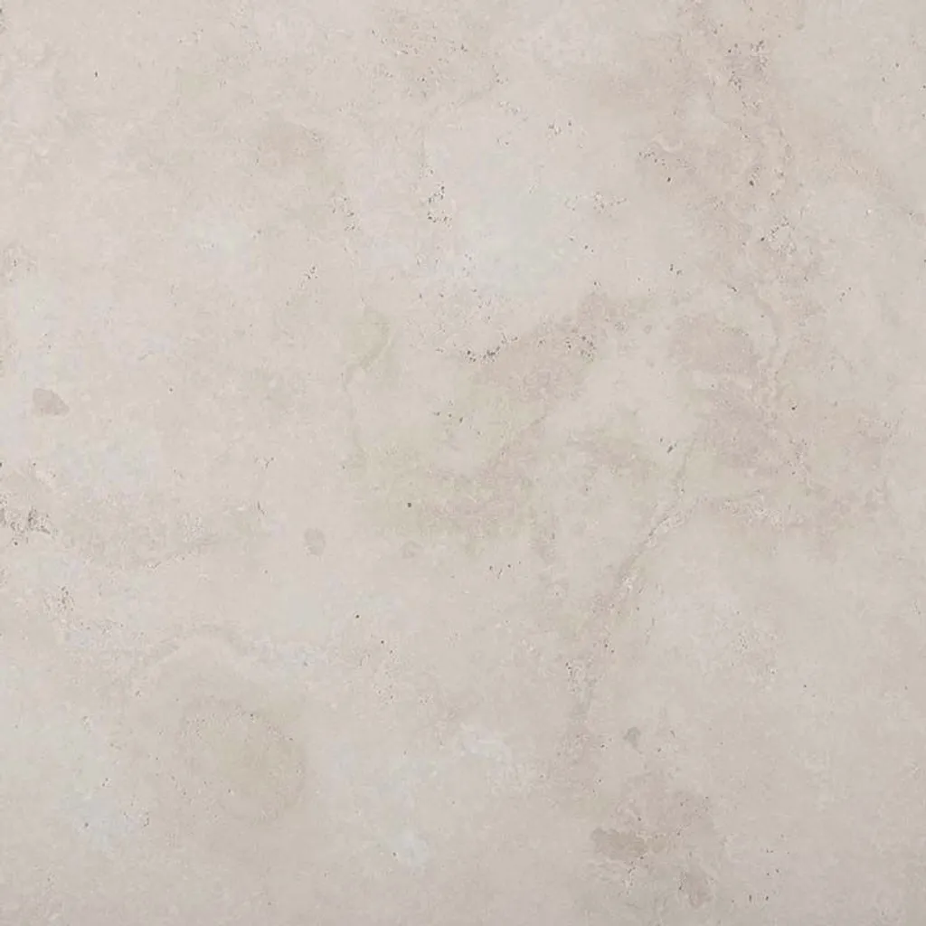 Travertine Bianca: pale cream with a soft, even texture